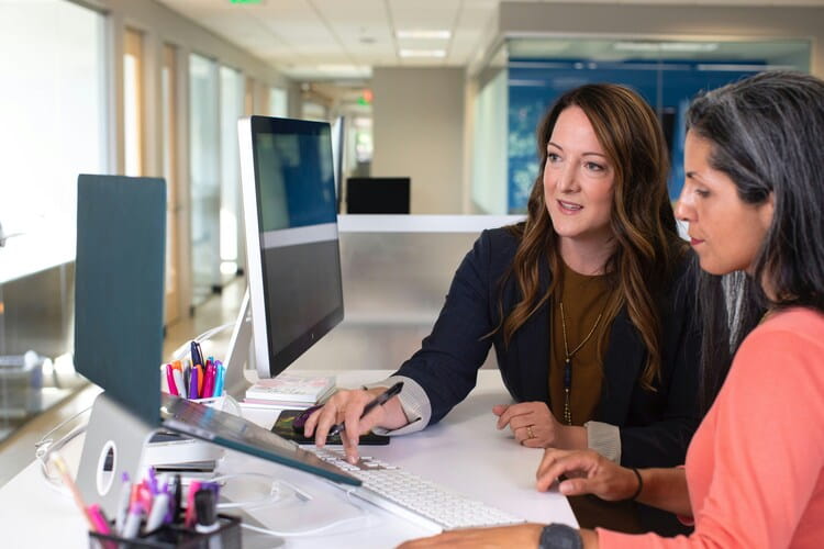 Women working collaboratively in the workplace