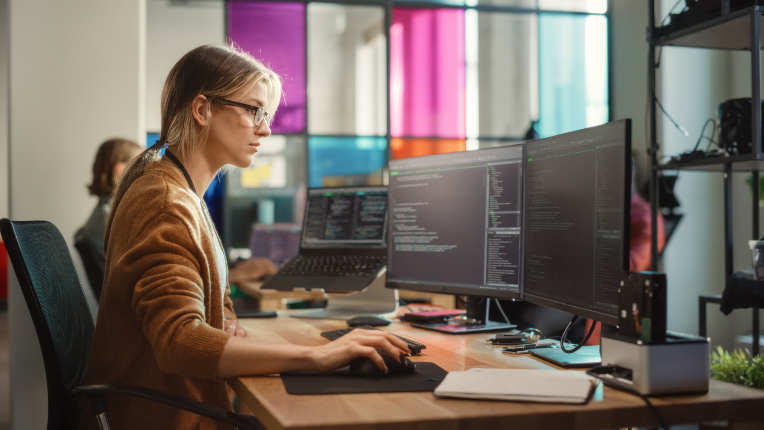 Female coder at computer