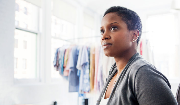 woman with clothes rack