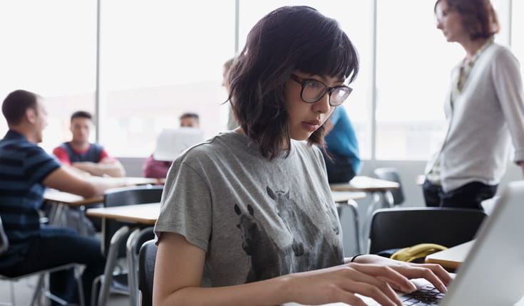 intense woman with laptop
