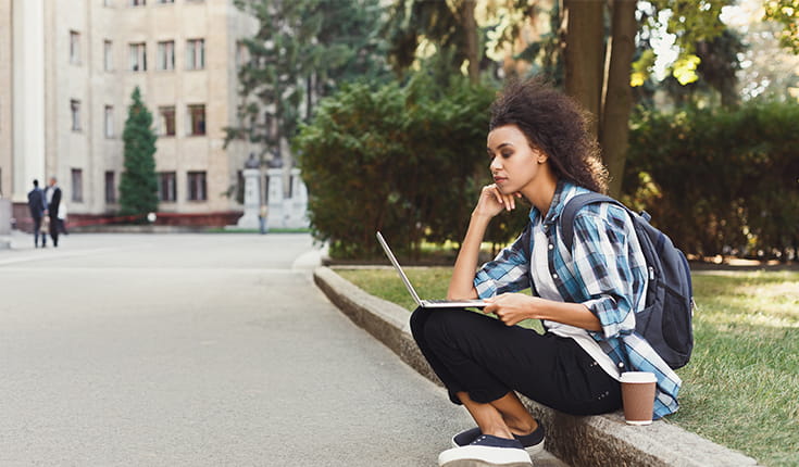 Studying on Curb 