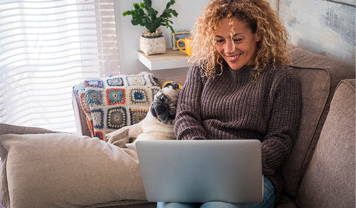 Woman and Pug Work from Home 
