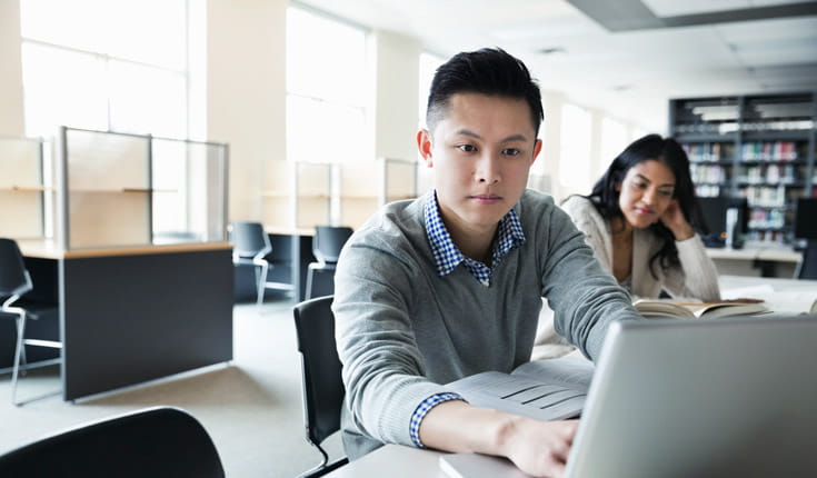 intense man at computer