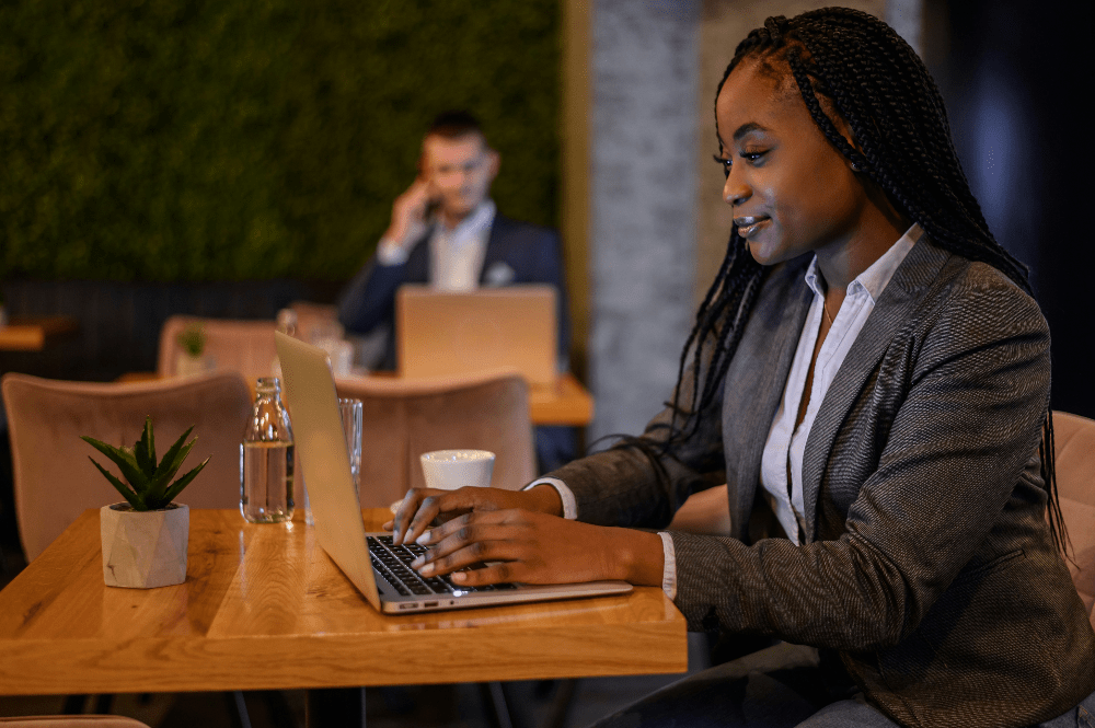 Female businesswoman typing on her laptop 